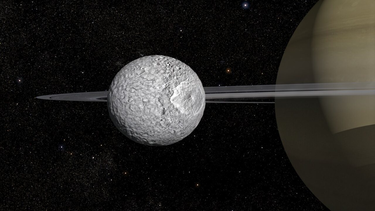Saturns måne Mimas op sort baggrund