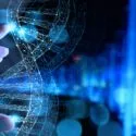 En hånd holder over en illustration af DNA