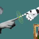 da vinci kigger skælmsk på robot og menneske hånd