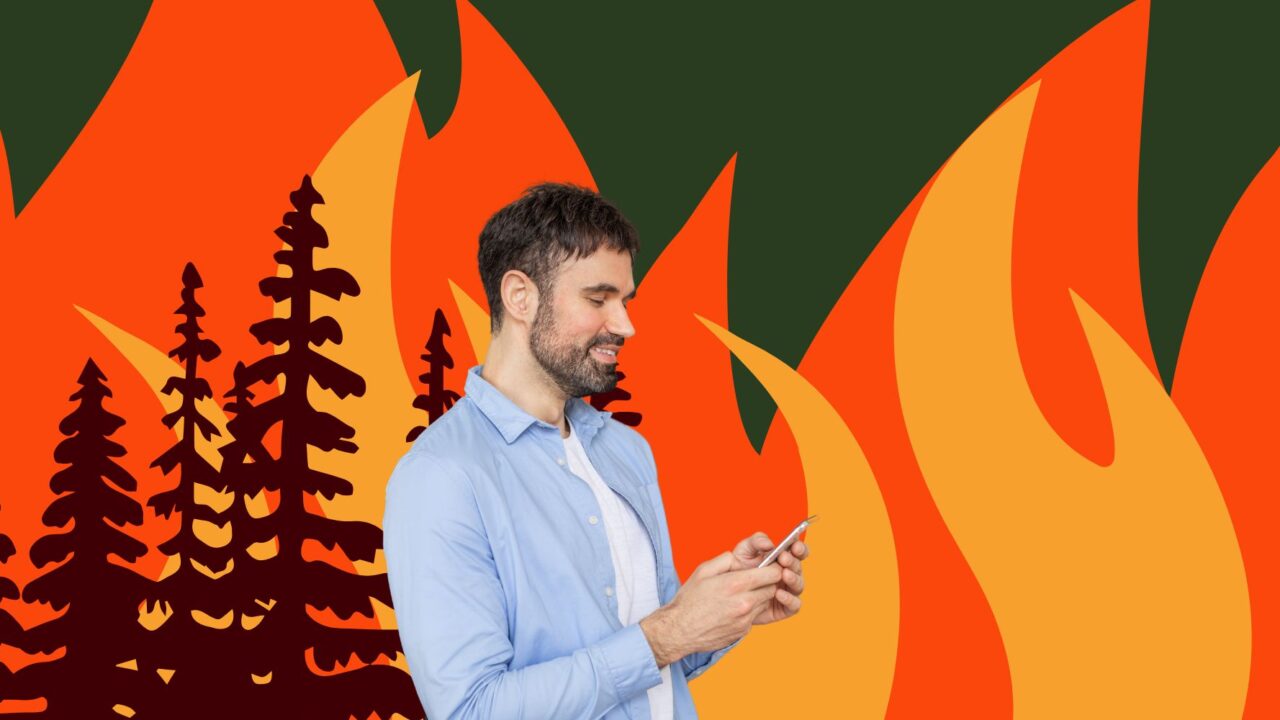 Illustration, hvor en mand kigger på sin mobil, mens verden står i flammer bag ham