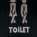Illustration af piktogrammer på en toiletdør