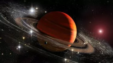 Illustration af Saturn med dens ringe, støv og måner