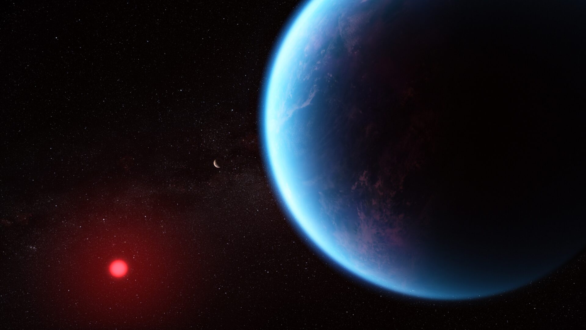 Exoplaneten K2-18b ved siden af sin røde dværgstjerne K2-18.