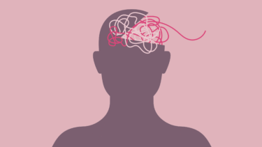 En silhuet af en persons hoved med et virvar af kaotiske linjer inde i hjerneområdet, der symboliserer mental forvirring eller stress, på en lyserød baggrund.