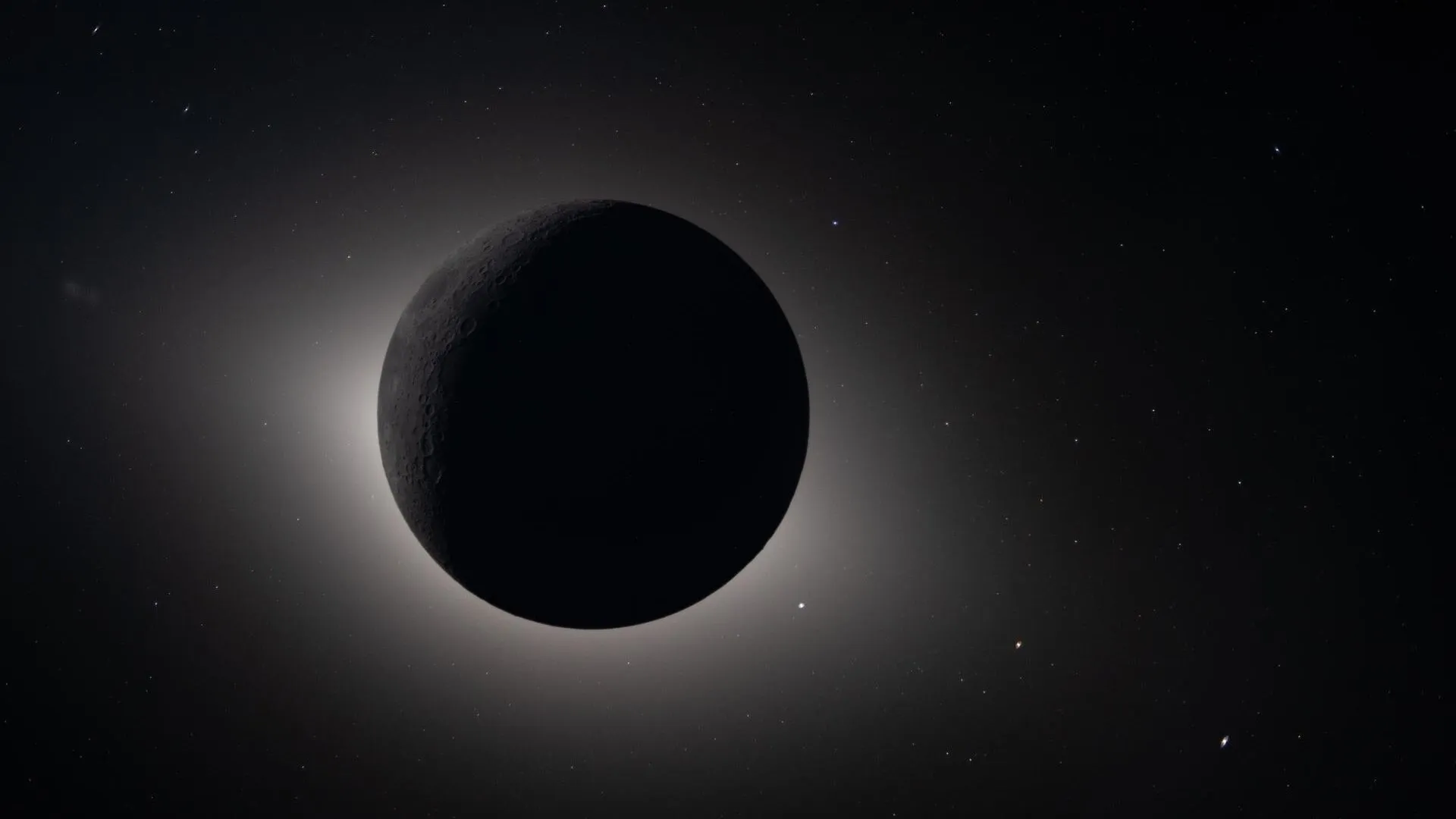 En mørk, skyggefuld planet eller måne er omgivet af en lysende glorie i rummet, som en solformørkelse set fra rummet, med mange svage stjerner spredt ud i baggrunden.